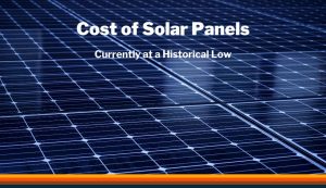 Image showing solar panels, with a text overlay stating 'Cost of solar panels currently at a historic low'